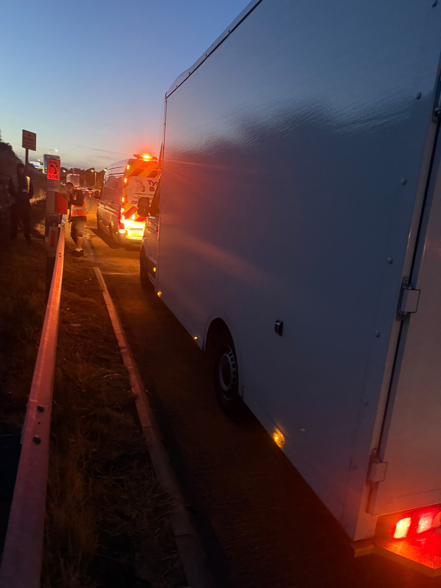 Rear of a van during a night-time roadside appointment